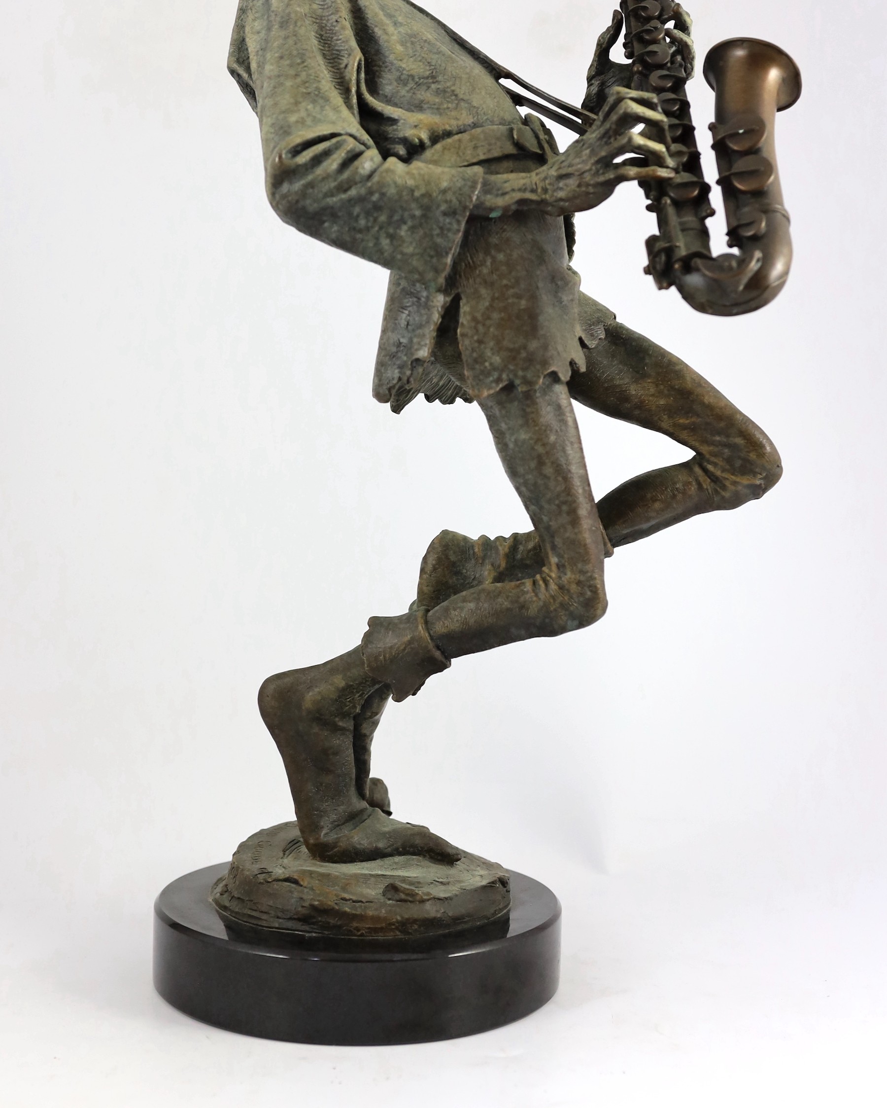 David Goode (British, b.1966). A bronze of a pixie saxophone player, height 61cm
